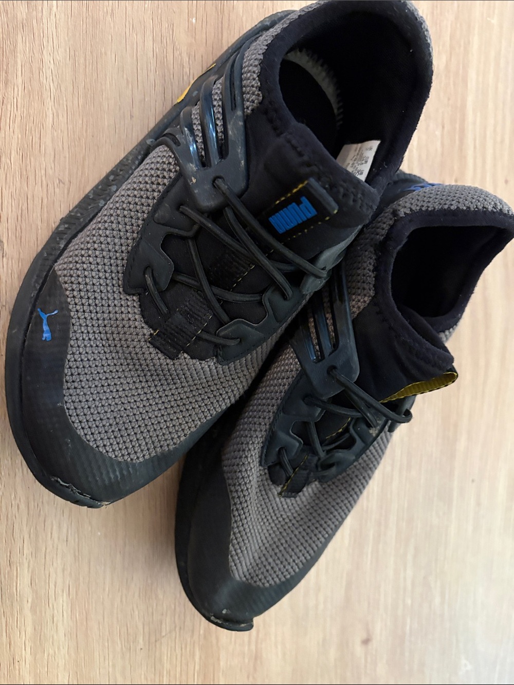 Puma Grey and Black Trainers with Blue Logo